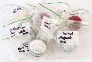 AUSTRALIA - PLAYER SIGNED CRICKET BALLS: comprising white balls (6) signed by Mark Taylor, Aaron Finch, Usman Khawaja, James Pattinson, Josh Hazlewood & James Faulkner; also red balls signed by Mitch Marsh & Peter Neville. (8)