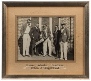 DON BRADMAN&nbsp;- NEW SOUTH WALES: c.late 1920s&nbsp; photograph (15x20cm) of Bradman&nbsp;posing&nbsp;with cricket bat, wearing his NSW blazer, alongside NSW team mates Hal Hooker & Arthur Chipperfield,&nbsp;plus two NSW Cricket association members; framed and glazed using prem