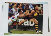 RICHMOND - PLAYER SIGNED COLOUR PRINTS:&nbsp;action images (46x31) of Dustin Martin, Matthew Richardson, Nathan Brown, and Andrew Raines.&nbsp;&nbsp;(4 items) - 2