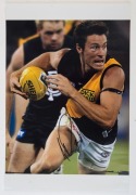 RICHMOND - PLAYER SIGNED COLOUR PRINTS:&nbsp;action images (46x31) of Dustin Martin, Matthew Richardson, Nathan Brown, and Andrew Raines.&nbsp;&nbsp;(4 items) - 4
