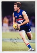 WESTERN BULLDOGS - PLAYER SIGNED COLOUR PRINTS:&nbsp;action images (46x31) of Adam Cooney,&nbsp;Barry Hall, Daniel Cross, Ryan Griffin and Shaun Higgins.&nbsp;(5 items) - 3