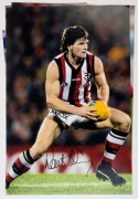 AFL/VFL&nbsp;-&nbsp;PLAYER SIGNED COLOUR PRINTS: mostly action images (46x31cm) of Bobby Skilton (South Melbourne), Paul Roos&nbsp;(Sydney Swans coach, image showing him raising the 2005 AFL Premiership Cup), Warren Tredrea (Port Adelaide), Alistair Lynch (Brisbane, ima - 3
