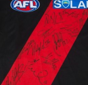 ESSENDON: Adidas guernsey (size M) with numerous signatures from the 2014 squad including Mark Thompson (coach), Jobe Watson (Capt.), Brendon Goddard, Paul Chapman, Michael Hurley and Dyson Heppell. - 3