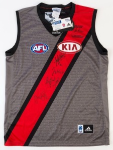 ESSENDON: Adidas 2013 'John Coleman' limited edition Adidas guernsey (size L), signed by Brownlow Medal winners Graham Moss, Gavin Wanganeen, James Hird & Jobe Watson.