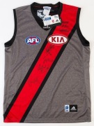 ESSENDON: Adidas 2013 'John Coleman'&nbsp;limited edition Adidas&nbsp;guernsey (size L), signed by Brownlow Medal winners Graham Moss, Gavin Wanganeen, James Hird & Jobe Watson.