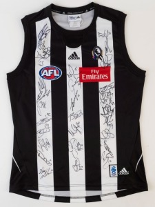 COLLINGWOOD - 2010 PREMIERSHIP YEAR: Adidas guernsey (size L), signed by whole of the 2010 squad including Nick Maxwell (capt.), Dane Swan, Dayne Beams, Luke Ball, Steele Sidebottom & Scott Pendlebury.