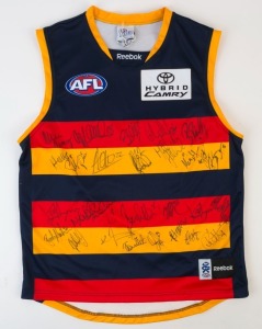 ADELAIDE: Reebok guernsey (size L), signed by numerous 2010 squad members including Patrick Dangerfield, Graham Johncock, Taylor Walker & Jack Gunston.