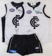 CARLTON: Nike (size XL) shorts and Away team&nbsp;guernsey&nbsp;both signed by Brendan Fevola, plus Nike (size XL) Away team guernsey&nbsp;signed by Anthony Koutoufides. (3 items)