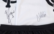 CARLTON: Nike (size XL) shorts and Away team&nbsp;guernsey&nbsp;both signed by Brendan Fevola, plus Nike (size XL) Away team guernsey&nbsp;signed by Anthony Koutoufides. (3 items) - 2