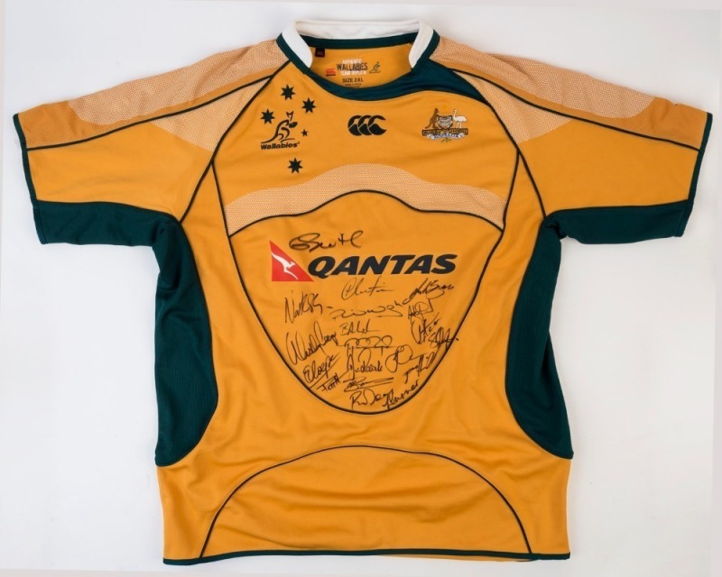 WALLABIES: c.2009-2011 era team signed guernsey with numerous signatures including Quade Cooper, Adam Ashley-Cooper, David Pocock & George Smith.