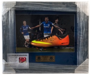 ARSENAL FC - THEO WALCOTT: Display featuring signed football boot and action photograph, attractively framed and window mounted, overall 50x60cm. Australian Sports Management CofA (2013)