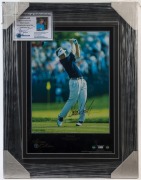 STUART APPLEBY: display featuring limited edition print, SIGNED BY APPLEBY&nbsp; showing the golfer&nbsp;teeing off at the 17th hole during the 2nd Round of the 2002 USA PGA Championship at Hazeltine&nbsp;National Golf Club;&nbsp;&nbsp;framed & glazed, overall 63x49cm.