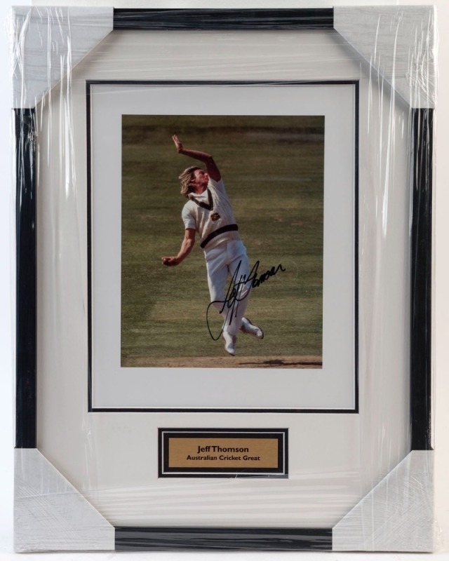 JEFF THOMSON: display featuring SIGNED colour action photo of Thomson in his delivery stride (25x20cm); attractively framed & glazed, overall 53x41cm. Icons of Sport CofA (2021).