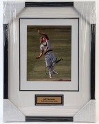 JEFF THOMSON: display featuring SIGNED colour action photo of Thomson in his delivery stride (25x20cm); attractively framed & glazed, overall 53x41cm. Icons of Sport CofA (2021).