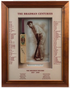 DON BRADMAN: "The Bradman Centuries" window display comprising a miniature bat SIGNED BY BRADMAN, set against a print of Sydney Riley's celebrated portrait photograph of "The Don", the surrounds showing a chronological listing of all his first class & tes