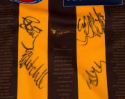 HAWTHORN: 'Celebrating 5 Decades of Flags'&nbsp;guernseys (2, L & 3XL)&nbsp;the former signed by Alastair Clarkson (Coach), Luke Hodge (Capt.), Sam Mitchell & Lance Franklin, the latter signed by Luke Hodge alone. (2) - 3