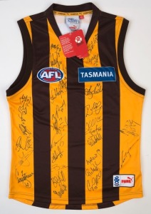 HAWTHORN - 2008 PREMIERSHIP YEAR: Puma guernsey (size L), numerous signatures from the premiership winning team including Campbell Brown, Jarryd Roughhead, Lance Franklin, Jordan Lewis & Shane Crawford.