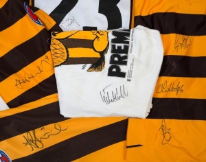 HAWTHORN: c.2008-12 signed guernseys comprising Norm Smith Medal winners Brian Lake (2013) Luke Hodge (2014) & Cyril Rioli (2015) on size 2XL top, Shane Crawford, Lance Franklin (on reverse) and Jarryd Roughead all on size L guernseys; also 2008 Premiers T-Shirt signed by captain Sam Mitchell. (5 items)