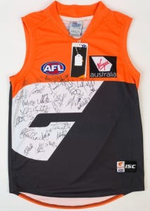 GREATER WESTERN SYDNEY - 2012 INAUGURAL YEAR: ISC guernsey (size XL), with numerous signatures including Adam Treloar, Toby Greene, Taylor Adams, Devon Smith, Sam Frost & Chad Cornes.