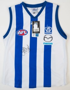 NORTH MELBOURNE: Blades guernsey (size L), signed by Kangaroos legend Brent "Boomer" Harvey.