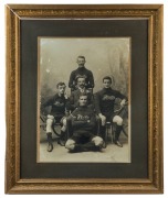 FITZROY BICYCLE CLUB PREMIER ROAD RACING TEAM 1904-05: large format silver gelatin photograph (57 x 41cm) laid down on card and displayed in a contemporary frame, overall 87 x 72cm. The team members are identified on a label affixed verso.