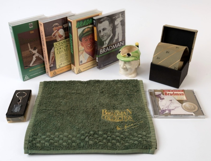 DON BRADMAN: Memorabilia selection with videos (3) comprising ABC production "Bradman", "The Bradman Era" & "Don Bradman - How to play Cricket", plus "Bradman - Reflections on the Legend" DVD & "The Humour of Bradman" CD; also 2008 Bradman Centenary tie (