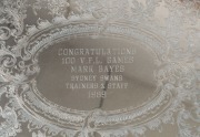 MARK BAYES - SYDNEY SWANS: oval salver presented to Bayes in 1989 for completing 100 VFL games; also circular 'Jock Bartlett Memorial Trophy' presented to Bayes in 1994; both salvers are silver plated and both were presented to Bayes by Sydney Swans train - 2