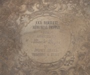 MARK BAYES - SYDNEY SWANS: oval salver presented to Bayes in 1989 for completing 100 VFL games; also circular 'Jock Bartlett Memorial Trophy' presented to Bayes in 1994; both salvers are silver plated and both were presented to Bayes by Sydney Swans train - 3
