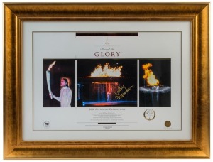 2000 SYDNEY OLYMPICS - CATHY FREEMAN: signature in gold pen on central image of a three-image "Blazed in Glory" display showing Freeman lighting the Olympic Cauldron, limited edition numbered #467 of 2000 produced, with CofA; framed & glazed, overall 62x84cm.