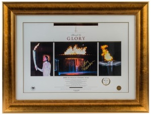 2000 SYDNEY OLYMPICS - CATHY FREEMAN: signature in gold pen on central image of a three-image "Blazed in Glory" display showing Freeman lighting the Olympic Cauldron, limited edition numbered #467 of 2000 produced, with CofA; framed & glazed, overall 62x8