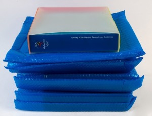 THE SYDNEY OLYMPIC FEDERATION ARCHIVES - LITERATURE: 'Sydney 2000 Olympic Games - Image Guidelines', album (with slipcase) of visual images created for Sydney 2000 Olympic Games detailing the policies and procedures regulating their use: 4 copies, as new.