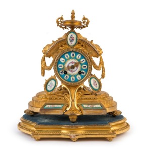 A French antique mantel clock in a gilt metal case with time and strike movement, Sevres porcelain panels and gilt wooden stand, 19th century, ​​​​​​​33cm high overall