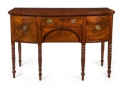 A George III mahogany sideboard with string inlay and six legs, circa 1800, 91cm high, 137cm wide, 60cm deep