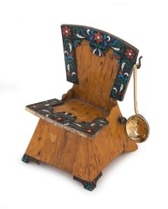 FABERGE. A Russian cloisonne enamel silver-gilt and birch wood miniature salt chair together with a miniature spoon. The chair (9cm high) hallmarked K. Faberge 88 and "BA" for Workmaster Johan Victor Aarne (1863 - 1934; born in Finland and worked for Faberge from 1891). The spoon is hallmarked "И C" for Sazikov Ignatiy Pavlovich. (2 items). 9cm high; 57 grams total weight.