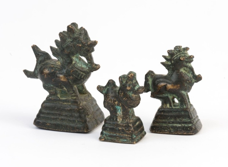 OPIUM WEIGHTS, antique Burmese set of three graduated bronze dragon weights, 19th century, ​​​​​​​the largest 5cm high