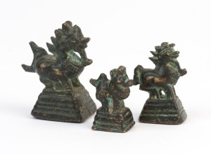 OPIUM WEIGHTS, antique Burmese set of three graduated bronze dragon weights, 19th century, the largest 5cm high