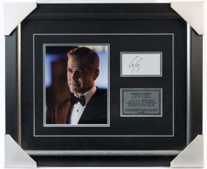 GEORGE CLOONEY signature in black felt tip on piece, mounted photographic display in frame, 50 x 60cm overall