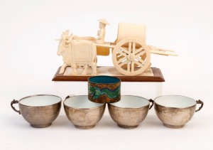 A Chinese carved bone and ivory cart ornament, an antique cloisonne napkin ring and a set of four silver and porcelain teacups, (6 items), the cart 18cm long
