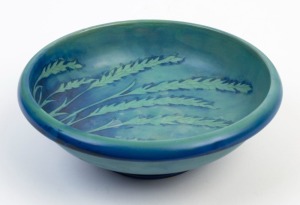 MOORCROFT "Waving Corn" pattern pottery bowl, circa 1920s, stamped "Made In England", with underglaze blue signature "W. Moorcroft", 7cm high, 20.5cm diameter
