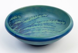 MOORCROFT "Waving Corn" pattern pottery bowl, circa 1920s, stamped "Made In England", with underglaze blue signature "W. Moorcroft", 7cm high, 20.5cm diameter