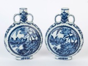 A pair of Chinese blue and white porcelain moon flask vases adorned with Mandarin ducks and lotus flowers, Republic Period, 20th century, six character underglaze blue Kangxi marks, 16cm high - 2