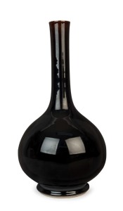 A Chinese jet black porcelain long neck vase, 19th/20th century, 45cm high