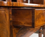 An impressive antique English mahogany bow front sideboard, beautifully crafted with handsome cuts of flame mahogany, string inlay, cross banding, six turned and reeded legs and original brass drop handles, early 19th century. One of the finest examples s - 4