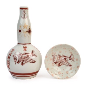 KAMEKAZI Japanese porcelain sake bottle and cup, adorned with the iconic Japanese fighter plane the Zero, circa 1940s, the bottle 22.5cm high