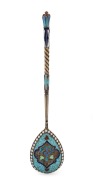 A superb Imperial Russian gilded silver and enamel spoon, hallmarked for Moscow, 88 and "OP" for Finnish born FABERGE&nbsp;Workmaster Oskar Woldemar Pihl&nbsp;(1890 - 1959);&nbsp;early 20th century. 13cm long, 17.5 grams.
