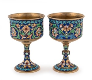 A beautiful pair of Imperial Russian gilded silver and cloisonne enamel goblets, circa 1908, by Maria Wasiliewna Semenova (who was working in Moscow from about 1890). Hallmarked Moscow (kokoshnik) 84, and "MC" (Maria Semenova). 9.5cm high. 230 grams total weight. Note: A LARGE CLOISONNÉ ENAMEL PARCEL-GILT SILVER KOVSH BY MARIA SEMENOVA, MOSCOW, 1908-1917 sold at Christies London for £40,000 + BP in November 2021.