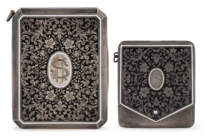 A Northern European pair of silver and enamel cases, both marked "935" and with engraved monogram "HS", the smaller example 6 x 5cm; the larger one 8.2 x 6.5cm, 164 grams total weight.