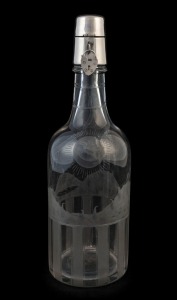An antique decanter with fine wheel-cut decoration and silver top with lock, 19th/20th century, 29cm high