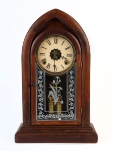 An antique American beehive mantel clock with 8 day time and strike movement, 19th century, 48cm high