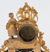 An antique French figural gilt metal clock, timepiece only with enamel dial and Roman numerals, together with a fine gilded stand with plush velvet top, 19th century, 34cm high overall - 2